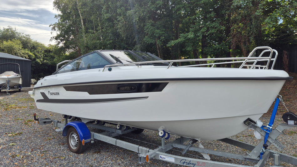 Yamarin 60 DC power boat with sleek design, in-stock, featuring comfortable seating and modern controls for outdoor water adventures.