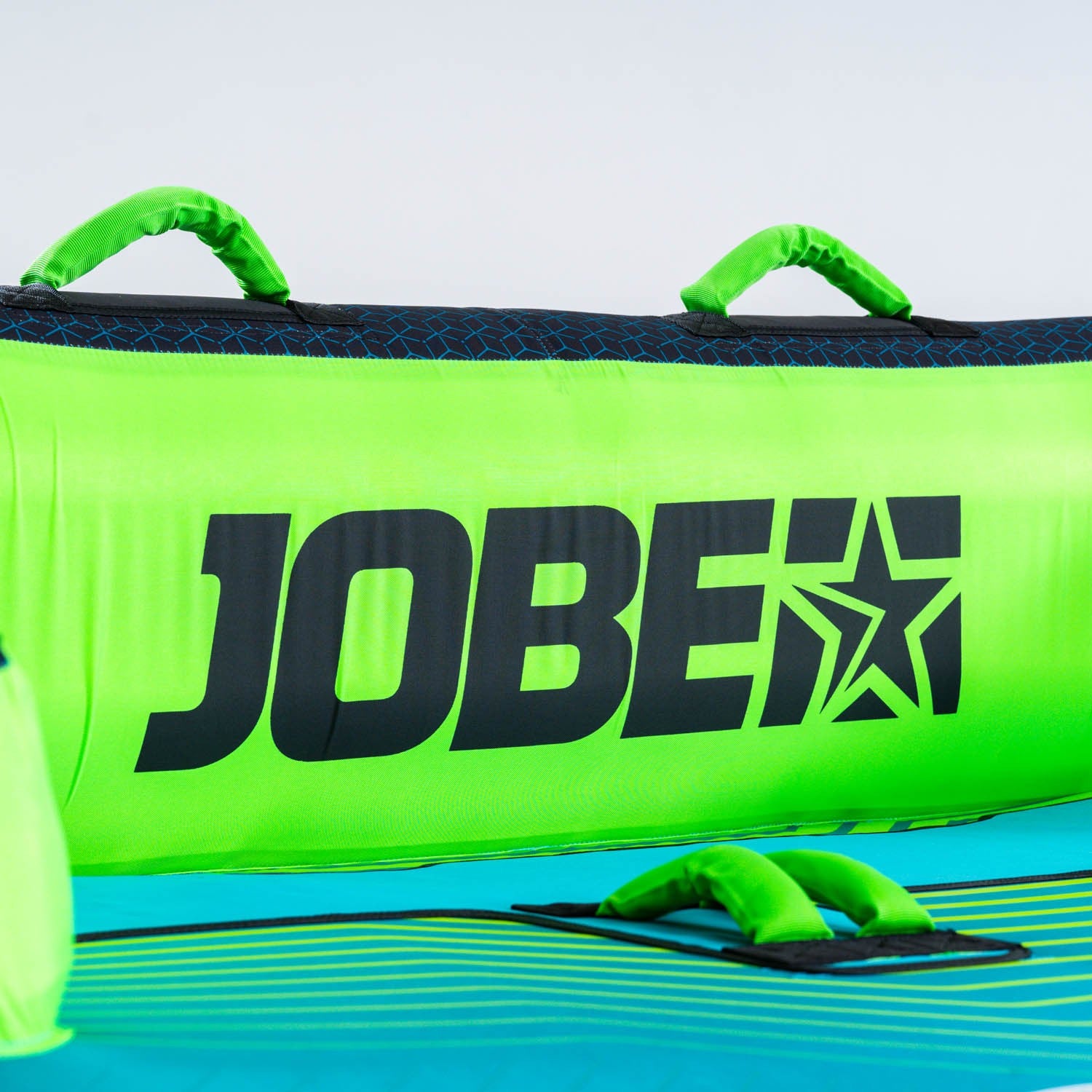 Jobe Binar Towable for three people, outdoor water sports equipment by Outdoor Hub Limited, shown on water with riders and tow rope.