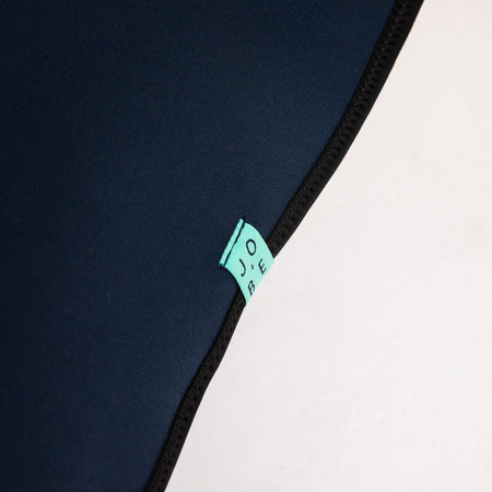 Black neoprene car seat cover by Jobe, fitted for a standard vehicle seat, with durable stitching and a sleek, snug fit.