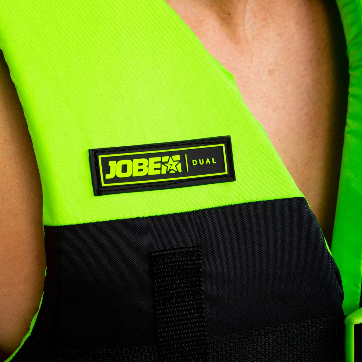 Lime green Jobe dual vest for water sports, featuring adjustable straps and padded flotation panels, outdoor activity gear by Outdoor Hub Limited.