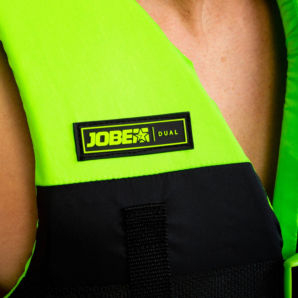 Lime green Jobe dual vest for water sports, featuring adjustable straps and padded flotation panels, outdoor activity gear by Outdoor Hub Limited.