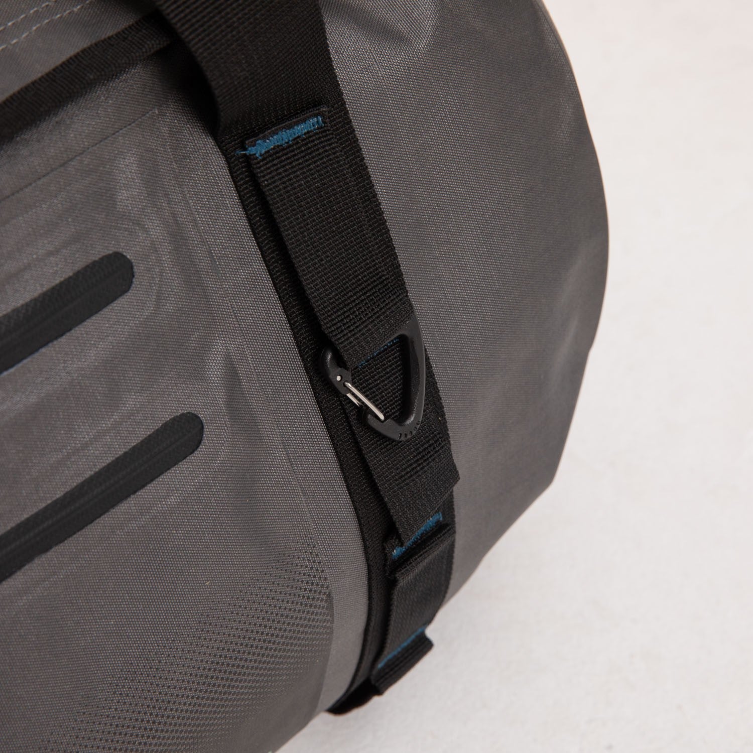 Grey Jobe water-repellent duffle bag by Outdoor Hub Limited, showing its durable fabric and spacious main compartment.