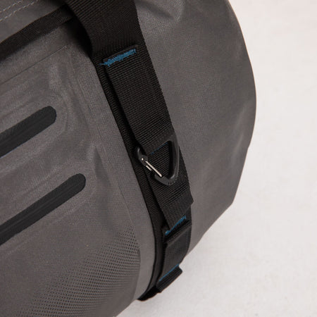 Grey Jobe water-repellent duffle bag by Outdoor Hub Limited, showing its durable fabric and spacious main compartment.