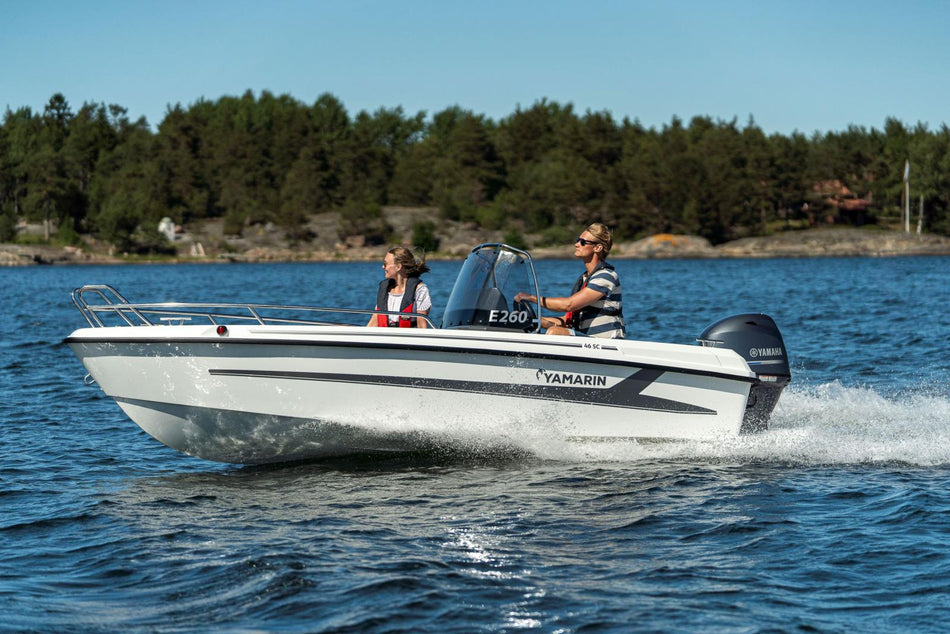 Yamarin 46SC power boat in blue with sleek design and spacious deck, ideal for leisure boating and water adventures.